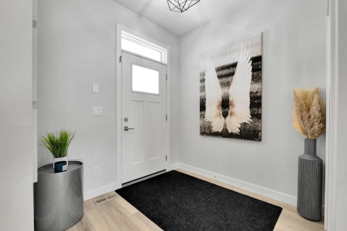 125 Emberside Hollow, Cochrane, AB - Indoor Photo Showing Other Room
