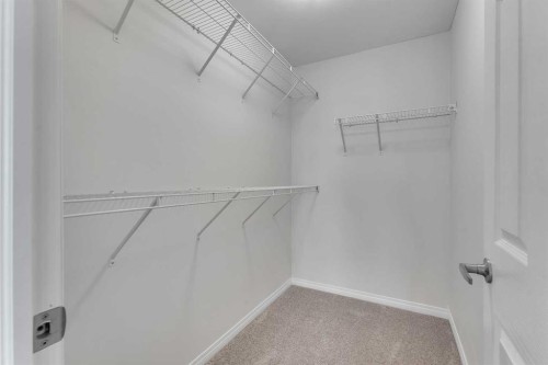 165 Windstone Avenue Sw, Airdrie, AB - Indoor With Storage