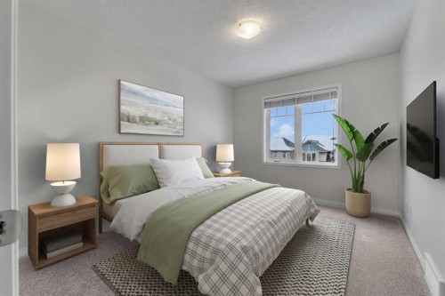 165 Windstone Avenue Sw, Airdrie, AB - Indoor Photo Showing Bedroom