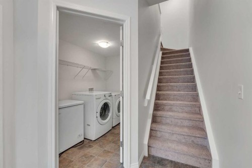 165 Windstone Avenue Sw, Airdrie, AB - Indoor Photo Showing Laundry Room
