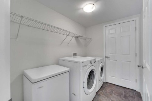 165 Windstone Avenue Sw, Airdrie, AB - Indoor Photo Showing Laundry Room