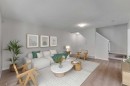 165 Windstone Avenue Sw, Airdrie, AB  - Indoor Photo Showing Living Room 