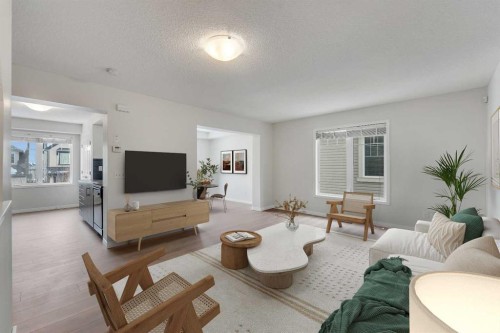 165 Windstone Avenue Sw, Airdrie, AB - Indoor Photo Showing Living Room