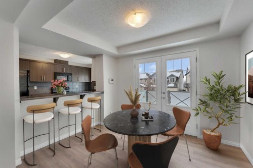 165 Windstone Avenue Sw, Airdrie, AB - Indoor Photo Showing Dining Room