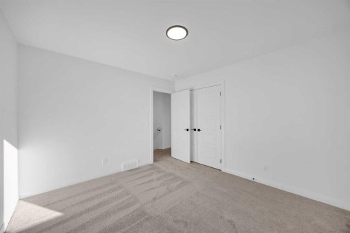 154 Northern Lights Crescent, Langdon, AB - Indoor Photo Showing Other Room