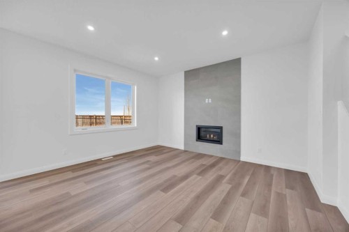 154 Northern Lights Crescent, Langdon, AB - Indoor With Fireplace