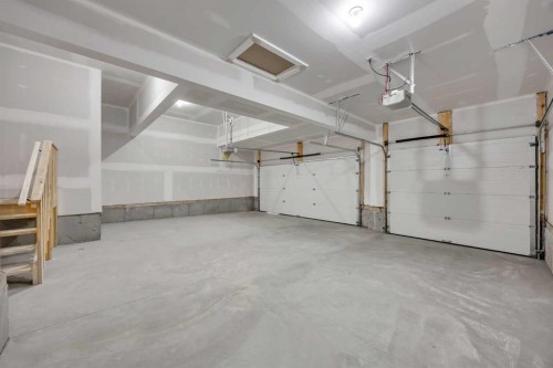 154 Northern Lights Crescent, Langdon, AB - Indoor Photo Showing Garage