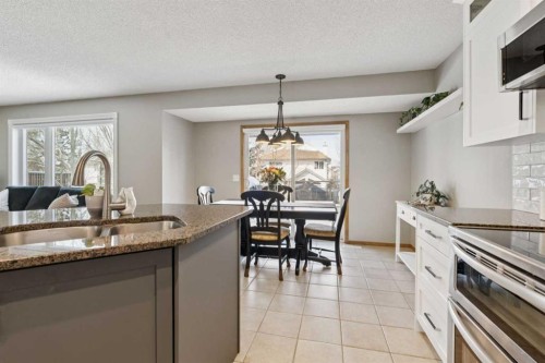 142 Cranfield Crescent Se, Calgary, AB - Indoor Photo Showing Kitchen With Double Sink