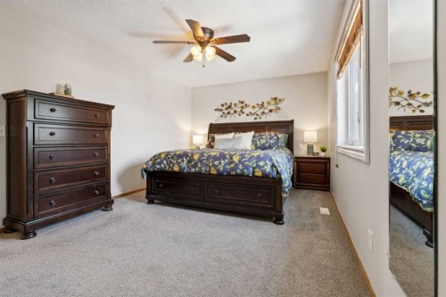 142 Cranfield Crescent Se, Calgary, AB - Indoor Photo Showing Bedroom
