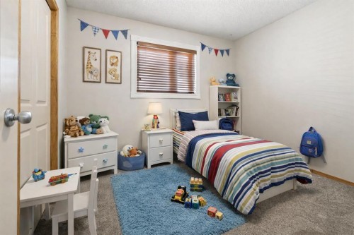 142 Cranfield Crescent Se, Calgary, AB - Indoor Photo Showing Bedroom