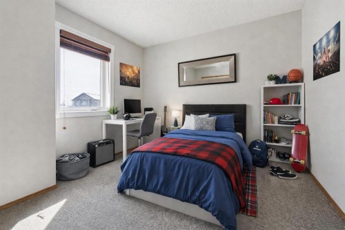 142 Cranfield Crescent Se, Calgary, AB - Indoor Photo Showing Bedroom