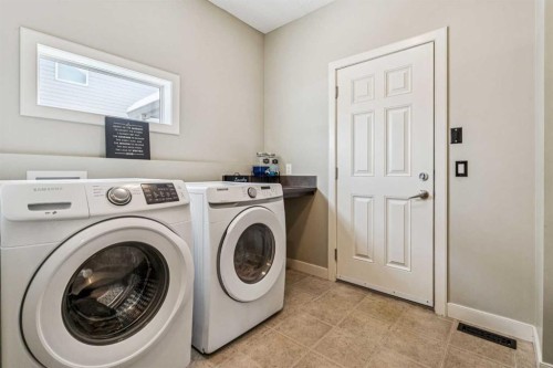 4 Drake Landing Gate, Okotoks, AB - Indoor Photo Showing Laundry Room