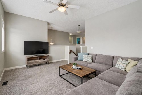 4 Drake Landing Gate, Okotoks, AB - Indoor Photo Showing Living Room