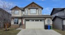 4 Drake Landing Gate, Okotoks, AB  - Outdoor With Facade 