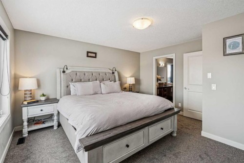 4 Drake Landing Gate, Okotoks, AB - Indoor Photo Showing Bedroom