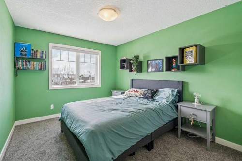 4 Drake Landing Gate, Okotoks, AB - Indoor Photo Showing Bedroom
