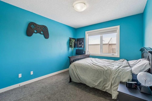 4 Drake Landing Gate, Okotoks, AB - Indoor Photo Showing Bedroom