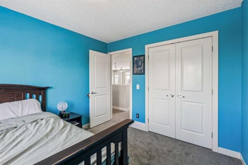 4 Drake Landing Gate, Okotoks, AB - Indoor Photo Showing Bedroom