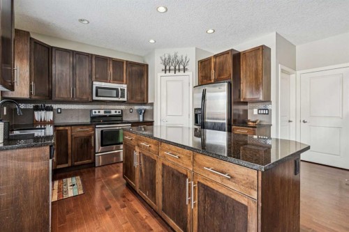 4 Drake Landing Gate, Okotoks, AB - Indoor Photo Showing Kitchen With Stainless Steel Kitchen