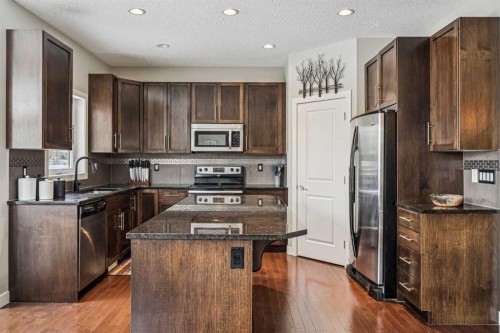4 Drake Landing Gate, Okotoks, AB - Indoor Photo Showing Kitchen With Stainless Steel Kitchen