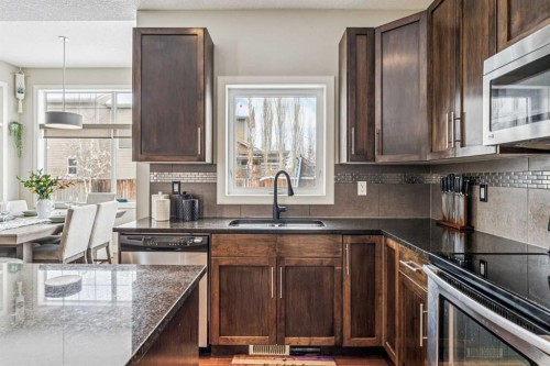 4 Drake Landing Gate, Okotoks, AB - Indoor Photo Showing Kitchen With Double Sink
