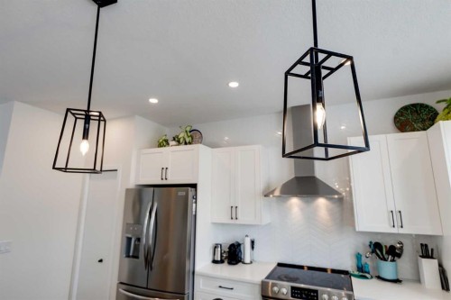237 South Point Park Sw, Airdrie, AB - Indoor Photo Showing Kitchen With Stainless Steel Kitchen