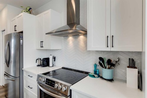 237 South Point Park Sw, Airdrie, AB - Indoor Photo Showing Kitchen With Stainless Steel Kitchen