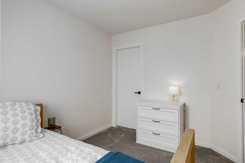 237 South Point Park Sw, Airdrie, AB - Indoor Photo Showing Bedroom