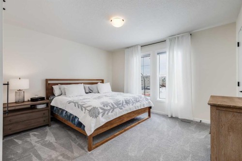 237 South Point Park Sw, Airdrie, AB - Indoor Photo Showing Bedroom