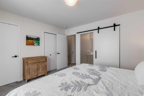 237 South Point Park Sw, Airdrie, AB - Indoor Photo Showing Bedroom