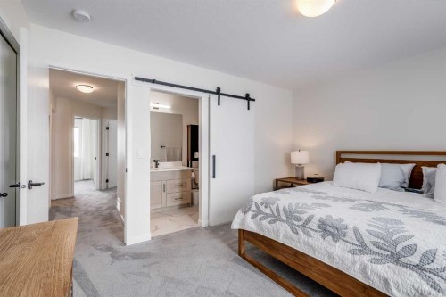 237 South Point Park Sw, Airdrie, AB - Indoor Photo Showing Bedroom