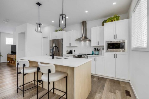 237 South Point Park Sw, Airdrie, AB - Indoor Photo Showing Kitchen With Stainless Steel Kitchen With Upgraded Kitchen