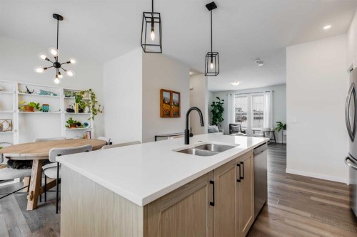 237 South Point Park Sw, Airdrie, AB - Indoor Photo Showing Kitchen With Double Sink