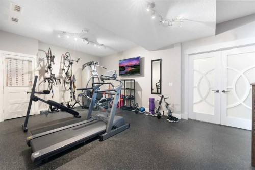 964 East Chestermere, Chestermere, AB - Indoor Photo Showing Gym Room
