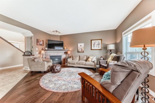 191 Pantego Close Nw, Calgary, AB - Indoor Photo Showing Living Room With Fireplace