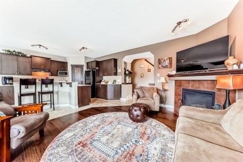 191 Pantego Close Nw, Calgary, AB - Indoor Photo Showing Living Room With Fireplace