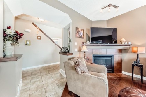 191 Pantego Close Nw, Calgary, AB - Indoor Photo Showing Living Room With Fireplace