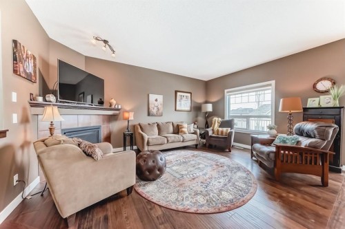 191 Pantego Close Nw, Calgary, AB - Indoor Photo Showing Living Room With Fireplace