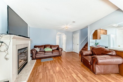 835 Westmount Drive, Strathmore, AB - Indoor Photo Showing Living Room With Fireplace