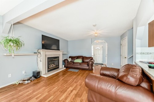 835 Westmount Drive, Strathmore, AB - Indoor Photo Showing Living Room With Fireplace