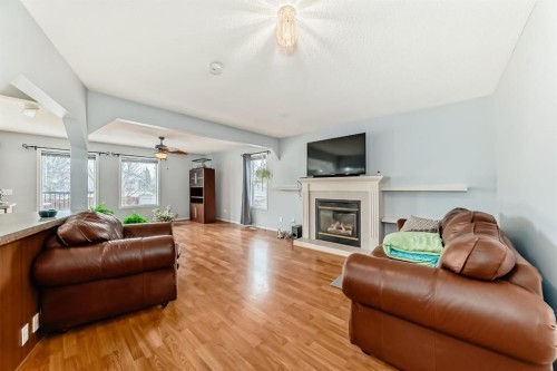 835 Westmount Drive, Strathmore, AB - Indoor Photo Showing Living Room With Fireplace
