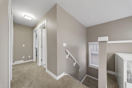 229 Rainbow Falls Glen, Chestermere, AB - Indoor Photo Showing Other Room