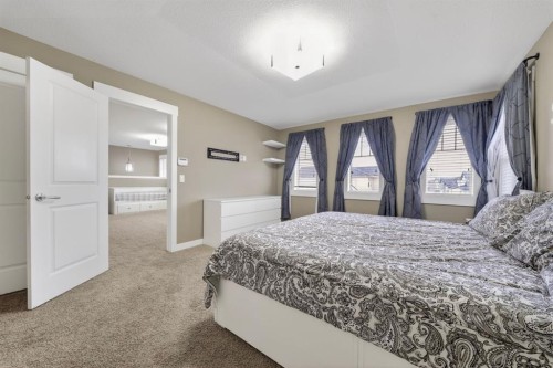229 Rainbow Falls Glen, Chestermere, AB - Indoor Photo Showing Bedroom