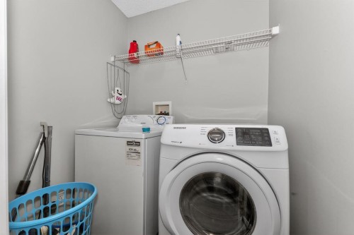 42 Royal Elm Drive Nw, Calgary, AB - Indoor Photo Showing Laundry Room