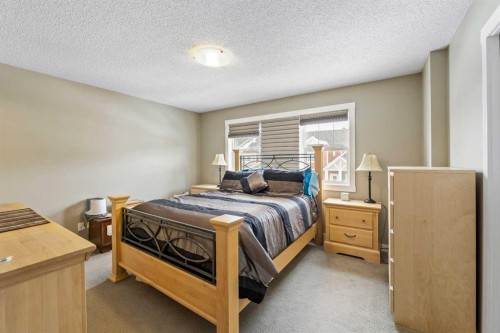 115 Baysprings Terrace Sw, Airdrie, AB - Indoor Photo Showing Bedroom