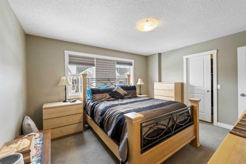 115 Baysprings Terrace Sw, Airdrie, AB - Indoor Photo Showing Bedroom