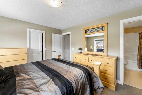 115 Baysprings Terrace Sw, Airdrie, AB - Indoor Photo Showing Bedroom
