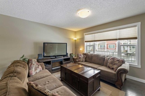 115 Baysprings Terrace Sw, Airdrie, AB - Indoor Photo Showing Living Room