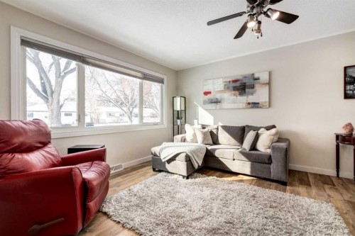 332 Avonburn Road Se, Calgary, AB - Indoor Photo Showing Living Room