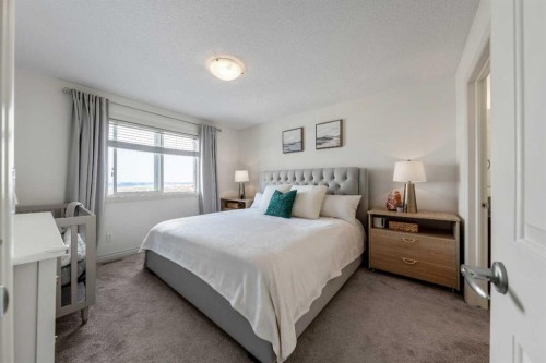 522 River Heights Crescent, Cochrane, AB - Indoor Photo Showing Bedroom